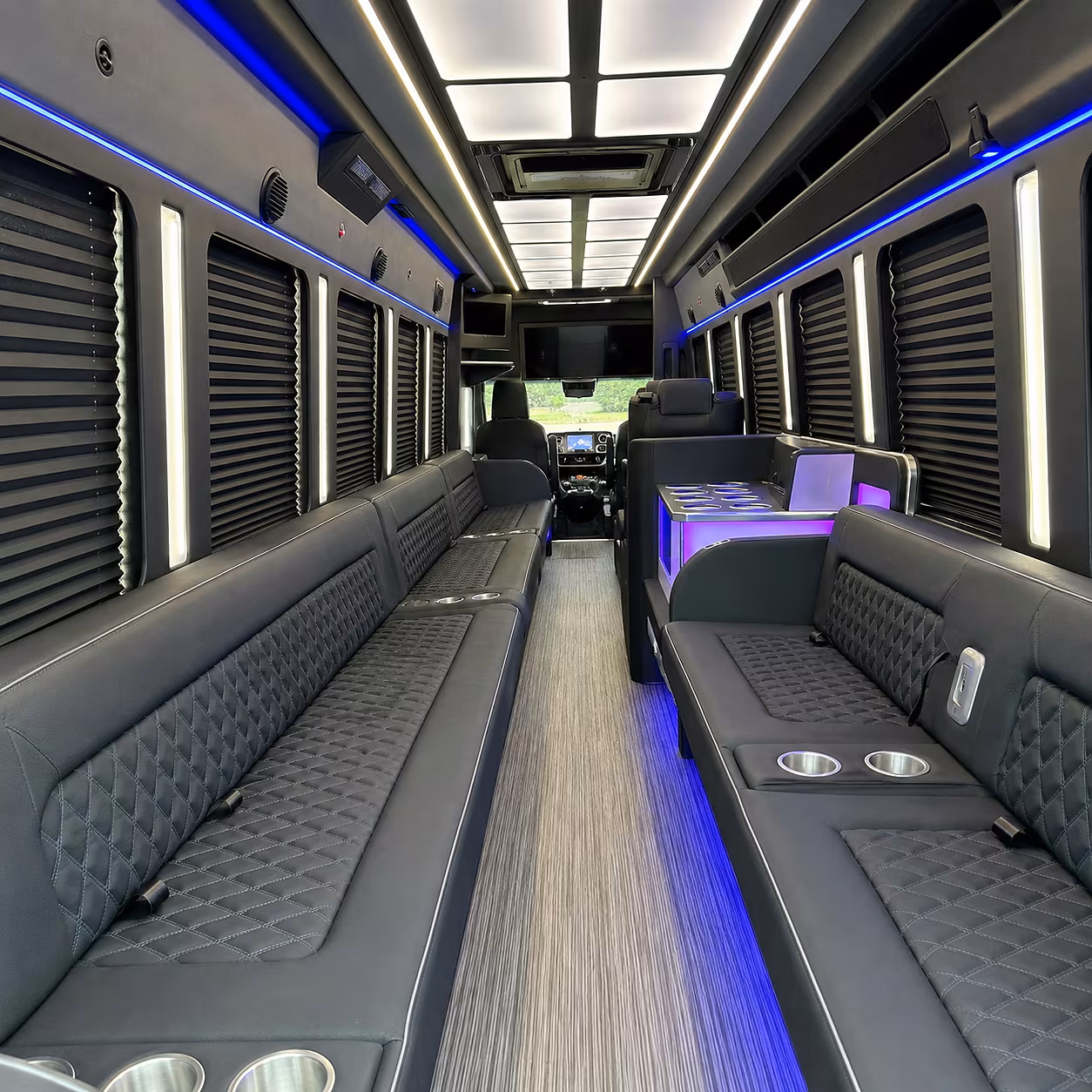 Wedding guests seated inside a party bus serving Henderson